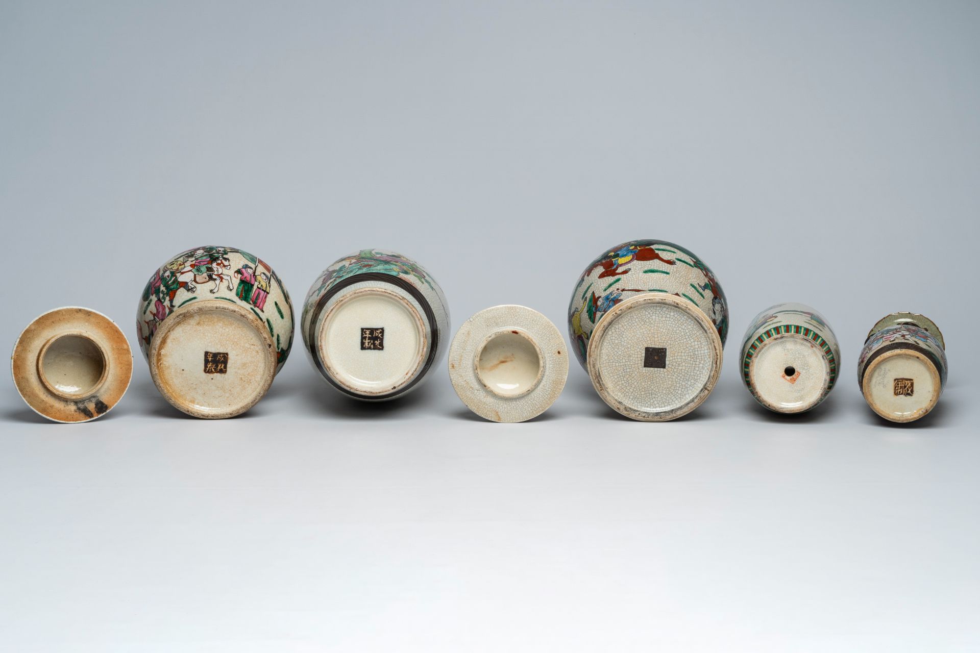 A varied collection of Chinese Nanking crackle glazed famille rose and verte vases and jars with war - Image 7 of 13