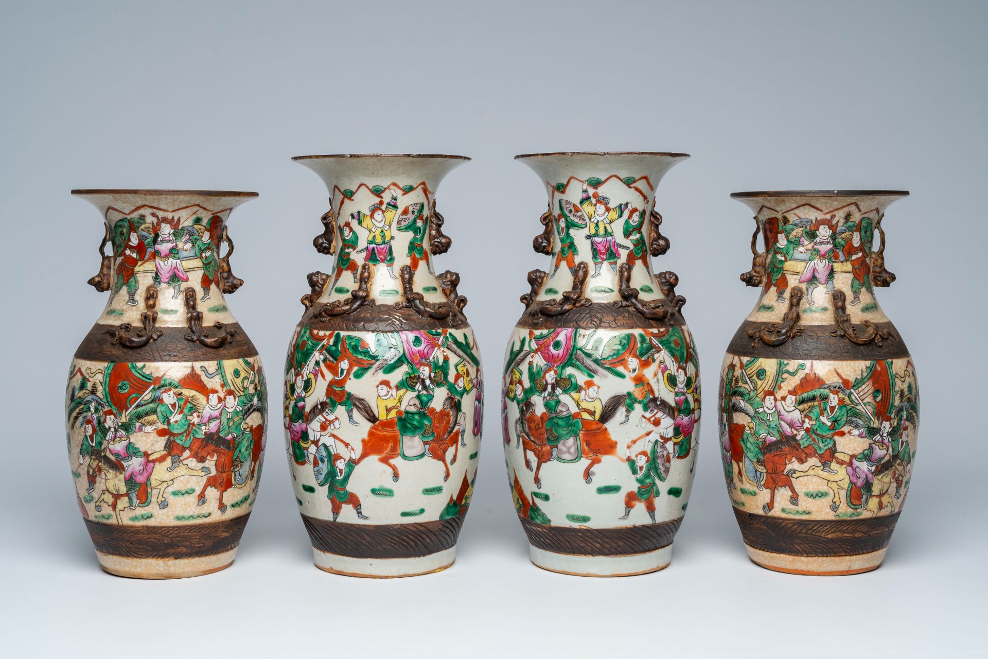 Two pairs of Chinese Nanking crackle glazed famille rose 'warrior' vases, 19th C. - Image 2 of 7