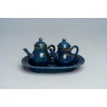 A Chinese powder blue and gilt cruet set, Qianlong