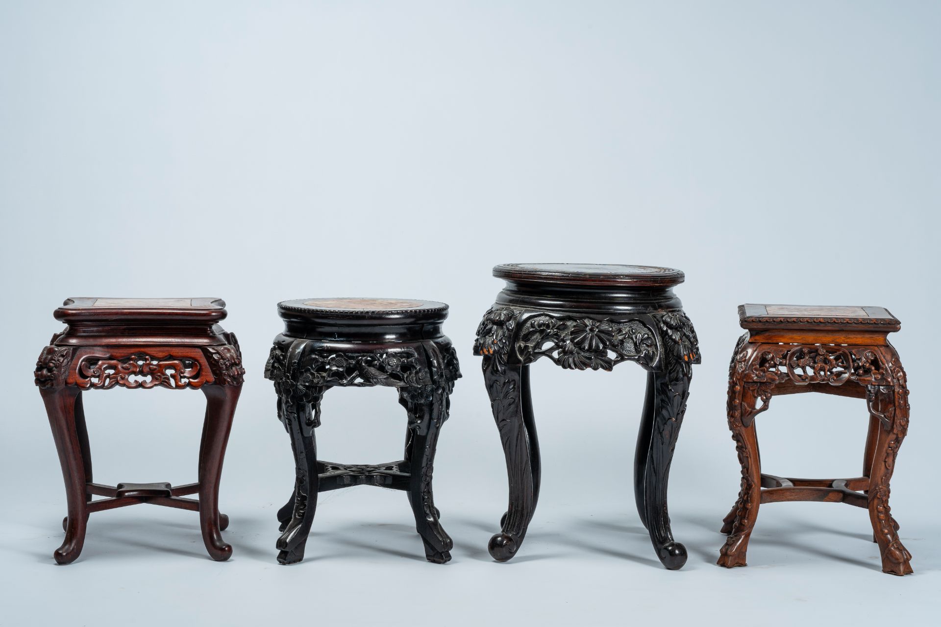 Four Chinese and Japanese open worked carved wood stands with marble and wood top, 20th C. - Image 2 of 7