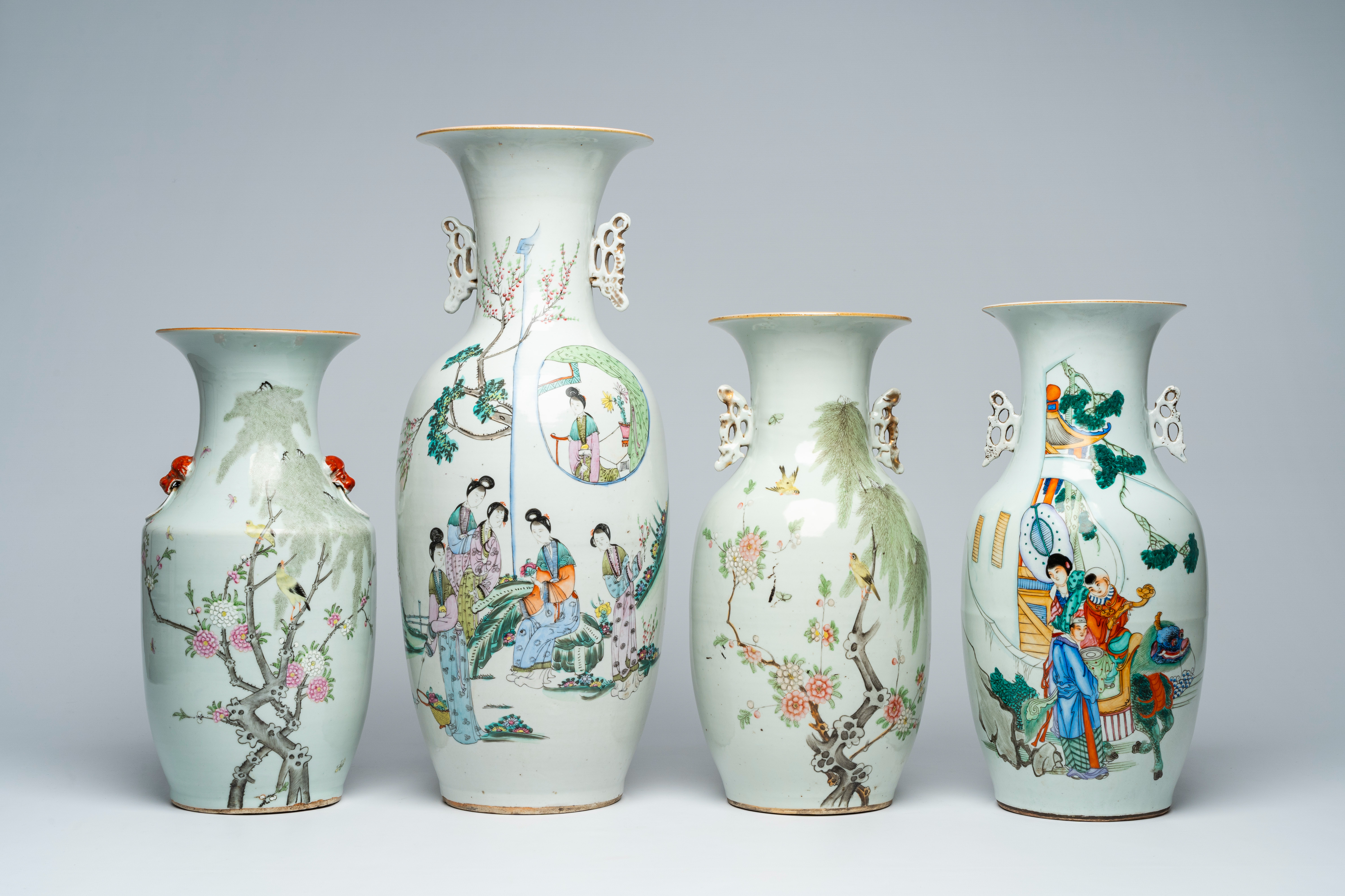 Four various Chinese famille rose and qianjiang cai vases with figures in a garden and birds among b