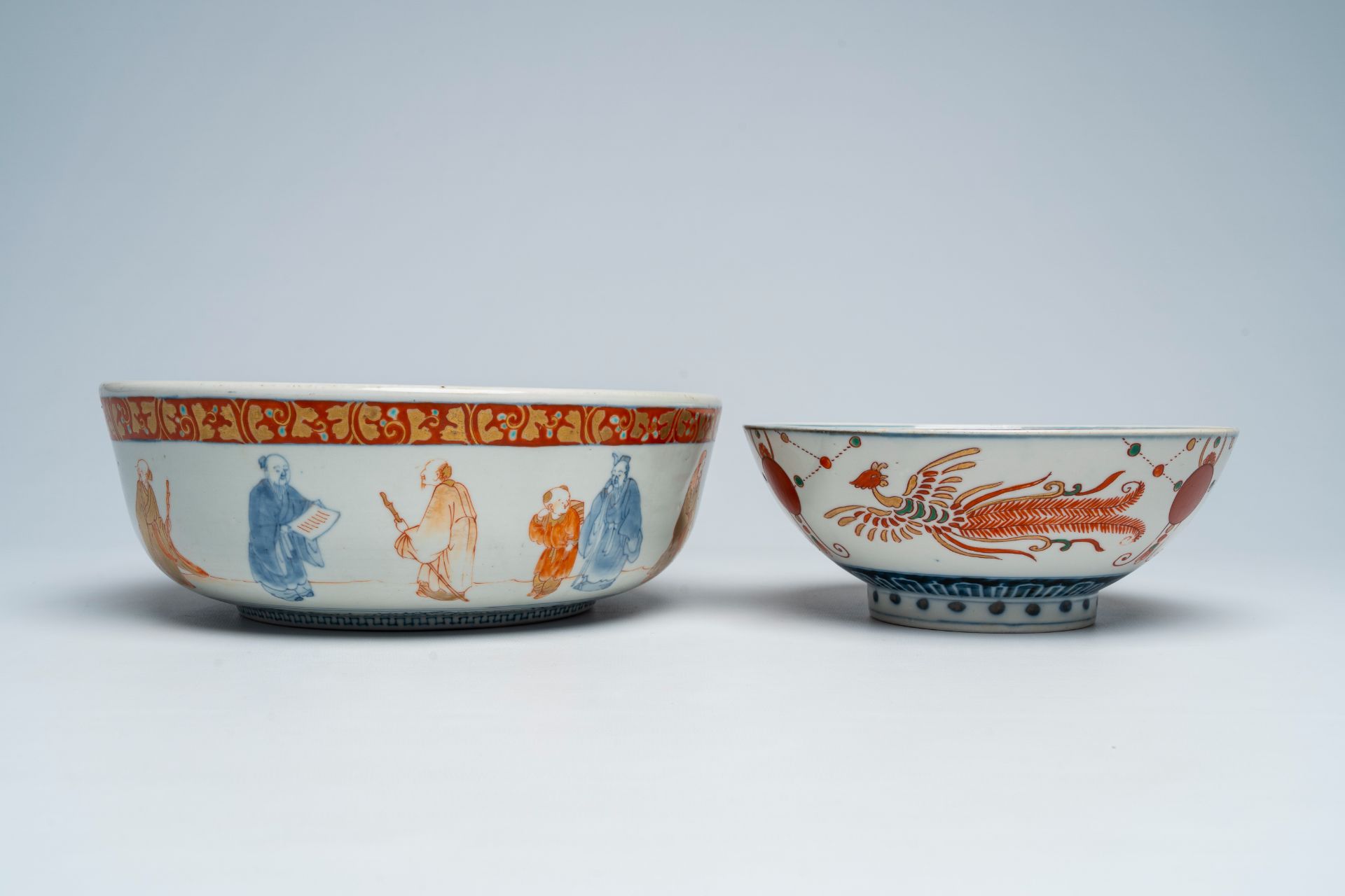 A Japanese Imari 'sages' bowl and a bowl with sailing ships and phoenixes, Meiji, 19th C. - Image 6 of 7