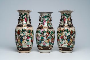 Three Chinese Nanking crackle glazed famille rose 'warrior' vases, 19th C.