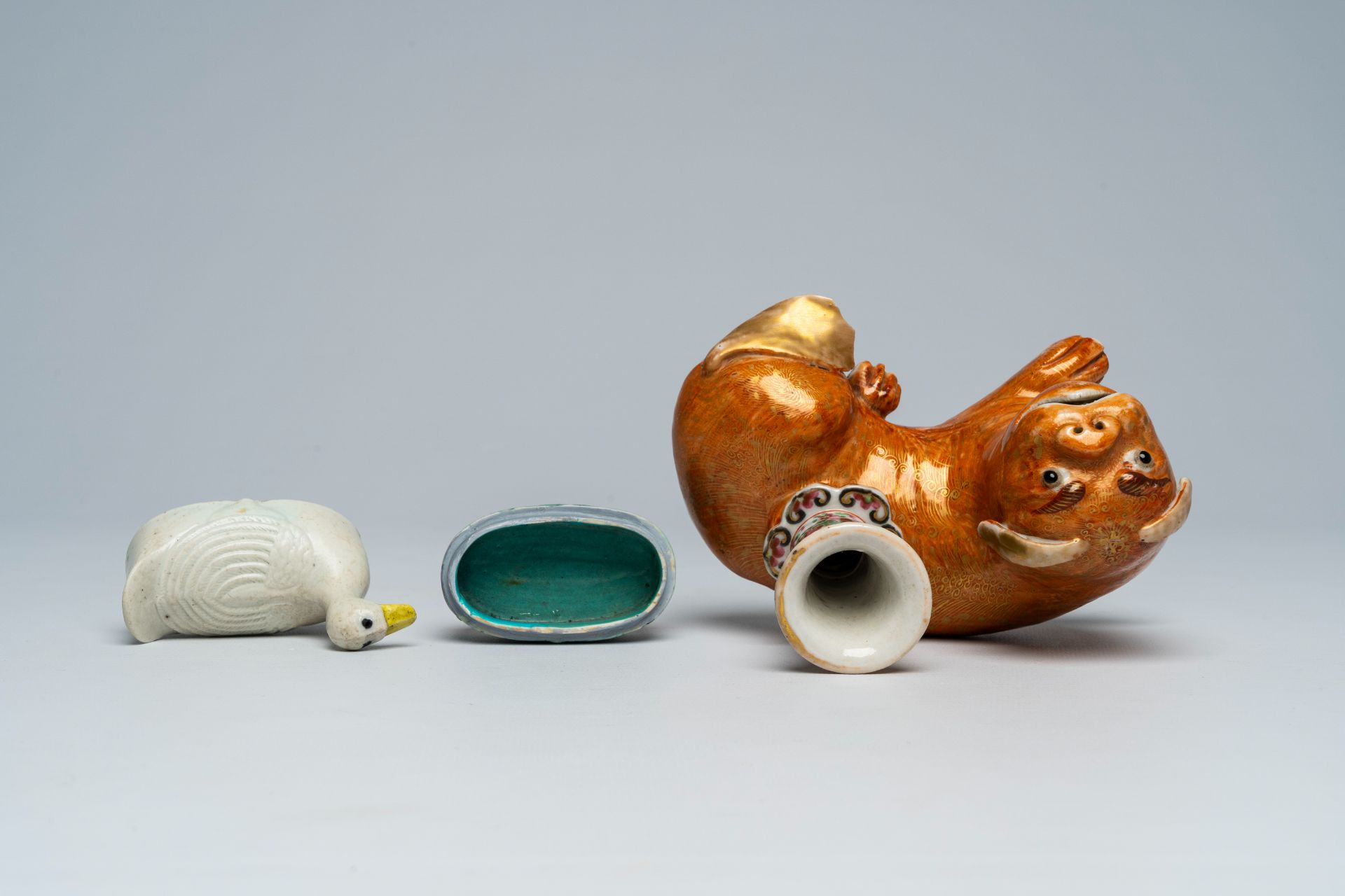 A Chinese Canton famille rose dog-shaped candlestick and a goose-shaped box and cover, 19th/20th C. - Image 6 of 7