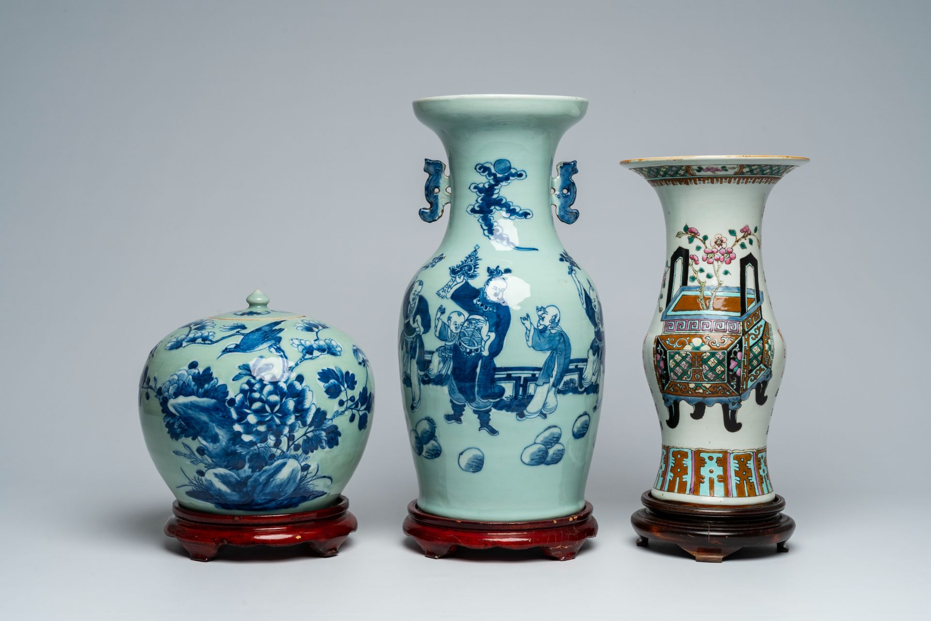 A Chinese blue and white celadon ground vase with figures in a garden, a ginger jar and a famille ro