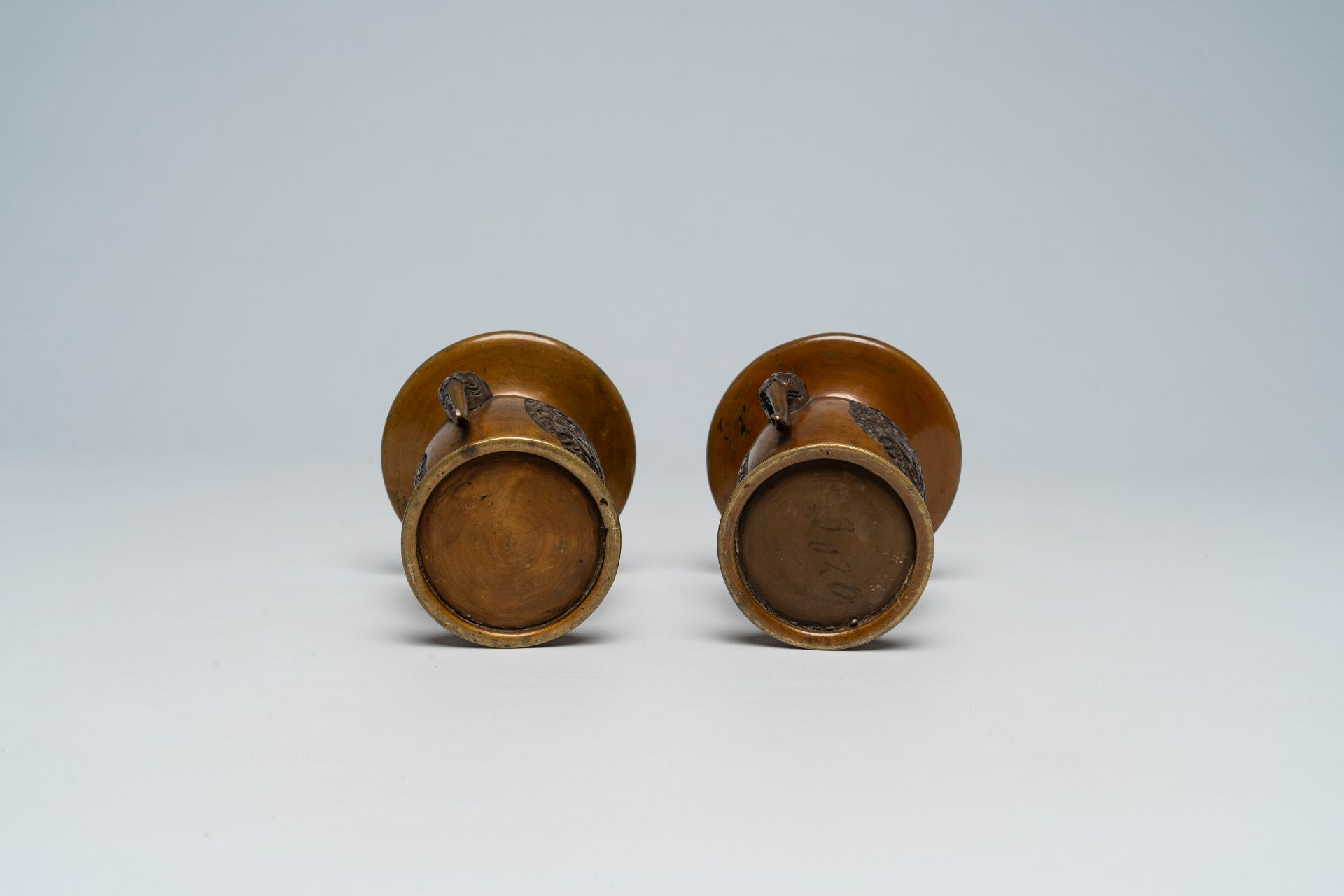 A pair of Japanese bronze vases, two mixed metal chargers with relief design, a blue and white dish - Image 21 of 21