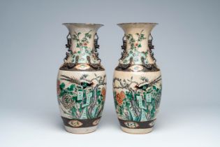 A pair of Chinese Nanking crackle glazed famille verte vases with a bird among blossoming branches,