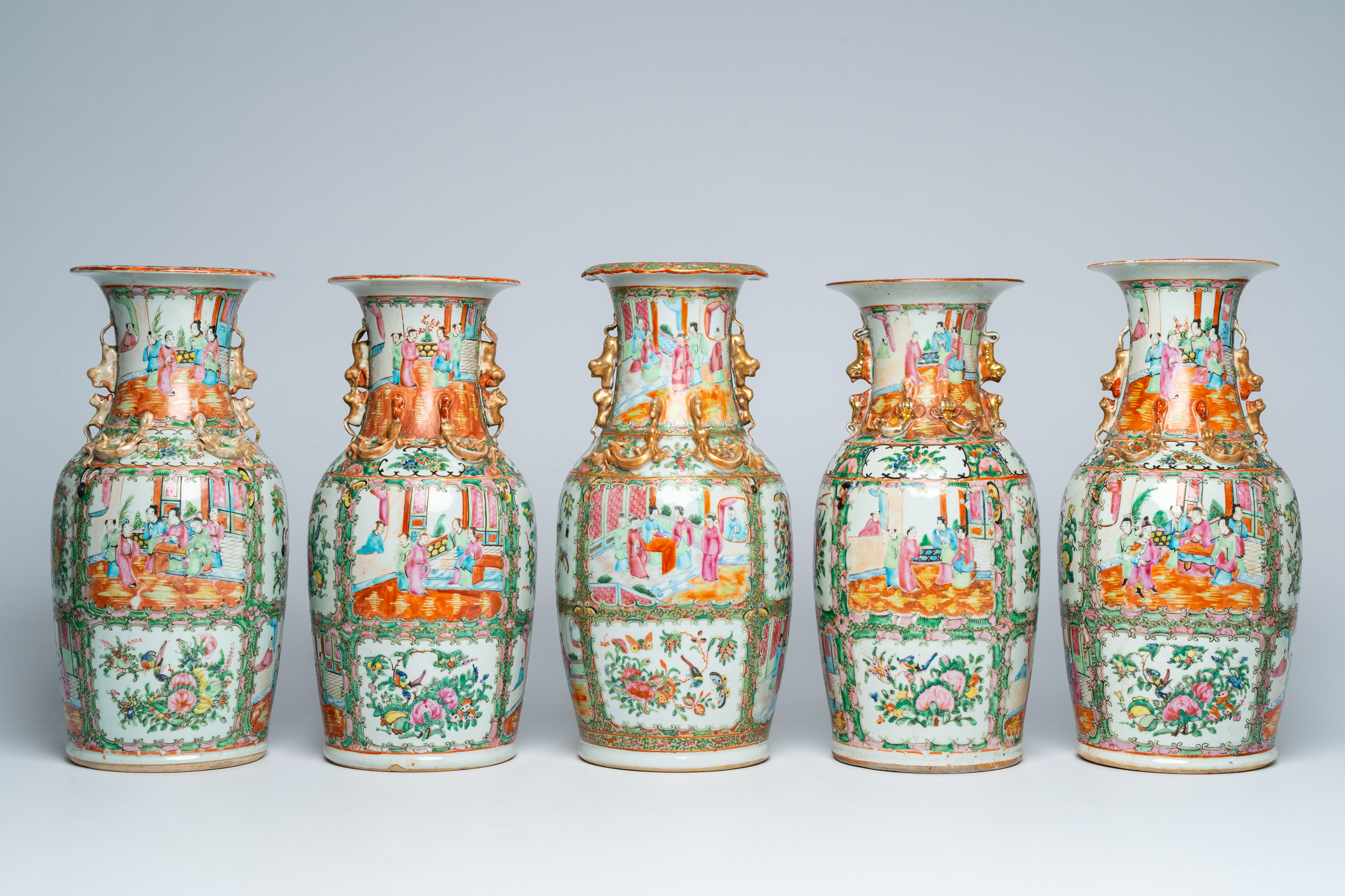 Five Chinese Canton famille rose vases with palace scenes and floral design, 19th/20th C.