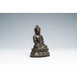 A Nepalese or Tibetan bronze figure of Buddha, 18th/19th C.