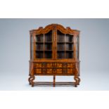 A Dutch two-door display cabinet with marquetry design of flowers, 18th C.