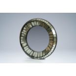 A large round Art Deco style mirror, 20th C.