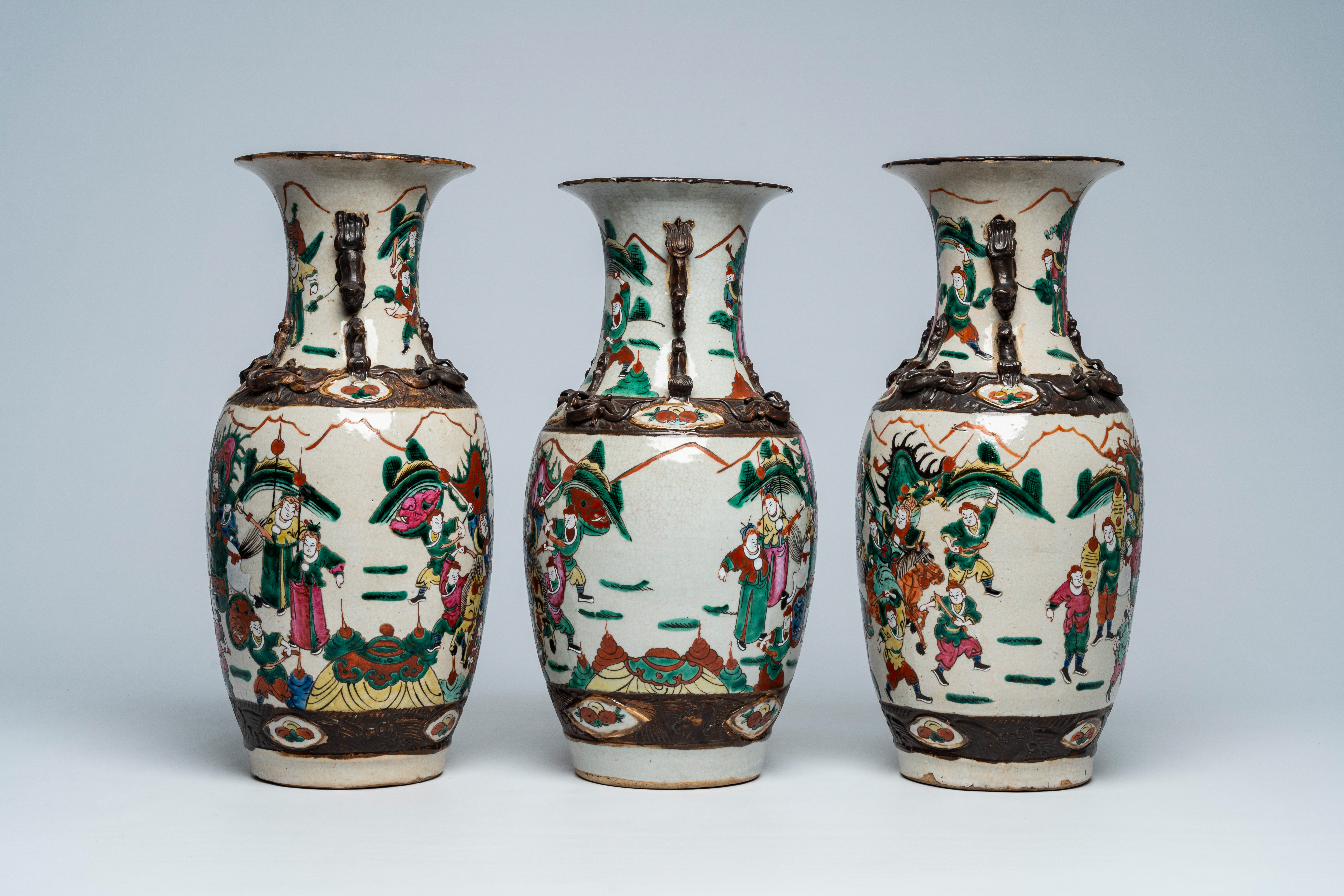 Three Chinese Nanking crackle glazed famille rose 'warrior' vases, 19th C. - Image 4 of 6