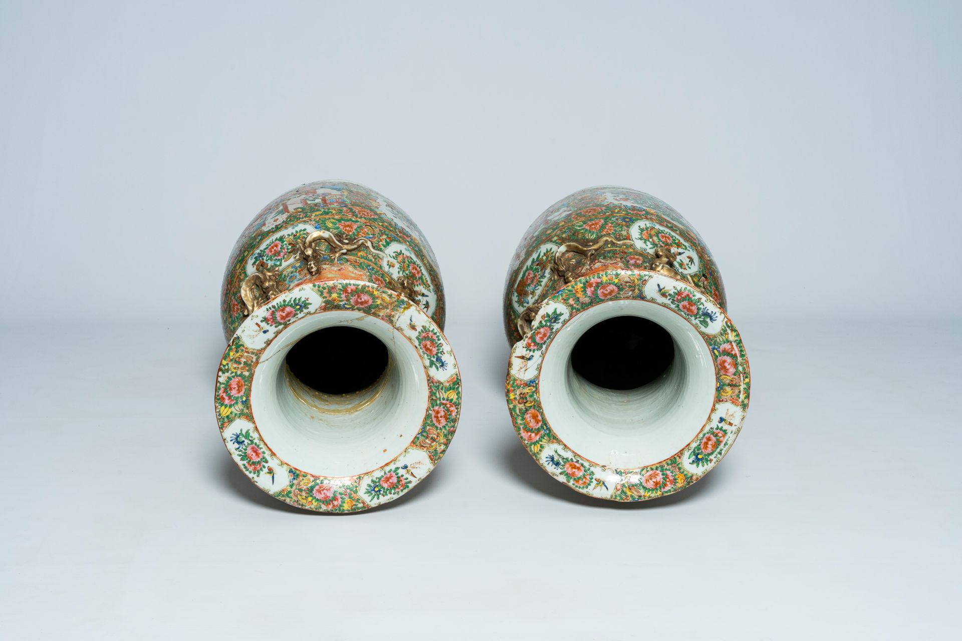 A pair of large Chinese Canton famille rose vases with palace scenes and floral design, 19th C. - Image 5 of 6