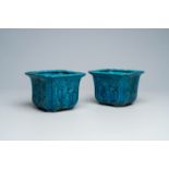 A pair of Chinese monochrome turquoise jardiniÃ¨res with floral relief design, 19th C.