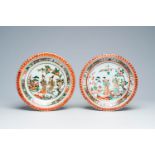 A pair of Chinese famille verte dishes with ladies in a garden, Kangxi