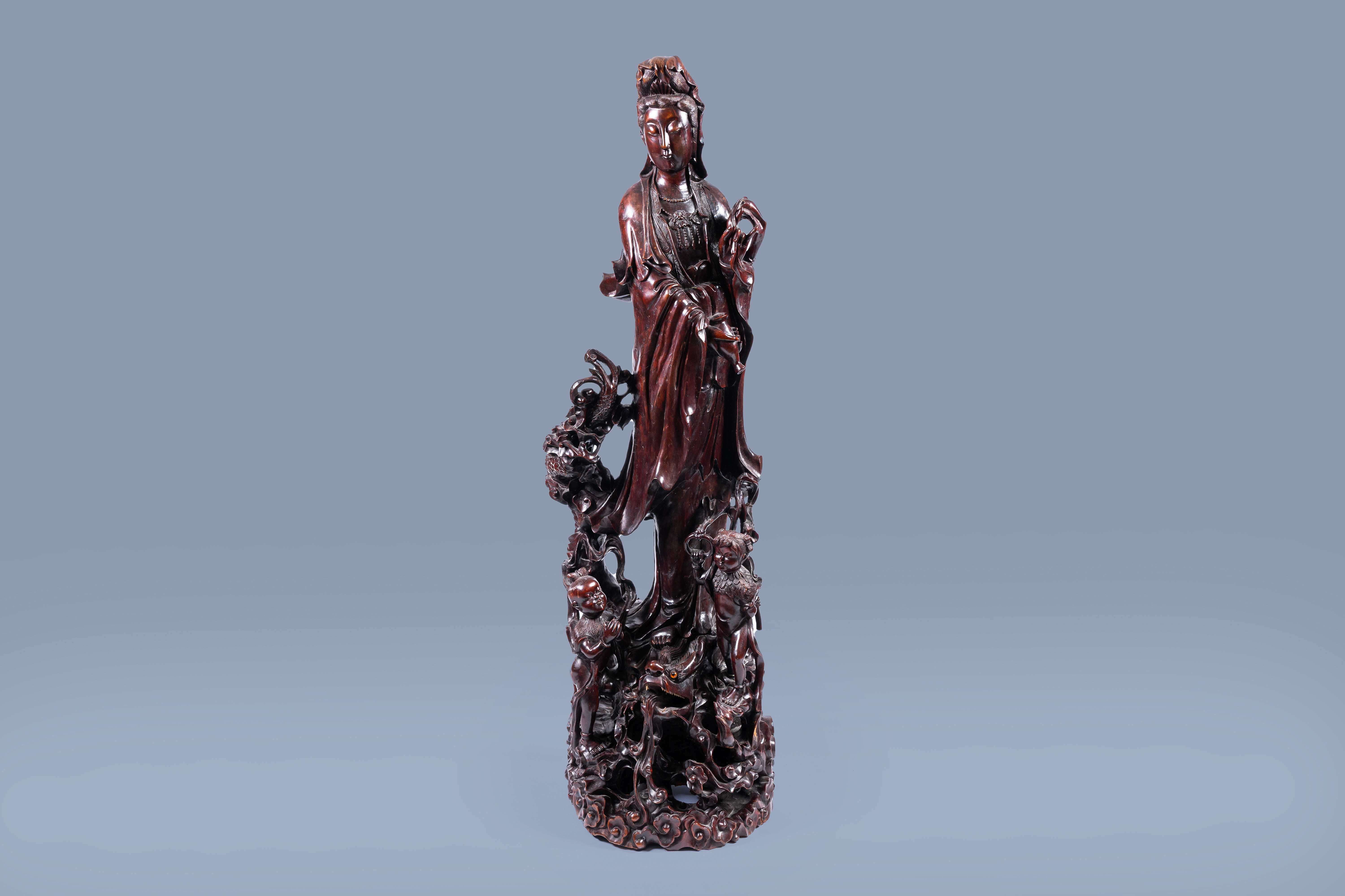 A massive Chinese carved wood group with a Guanyin, children and a dragon, 20th C. - Image 2 of 17