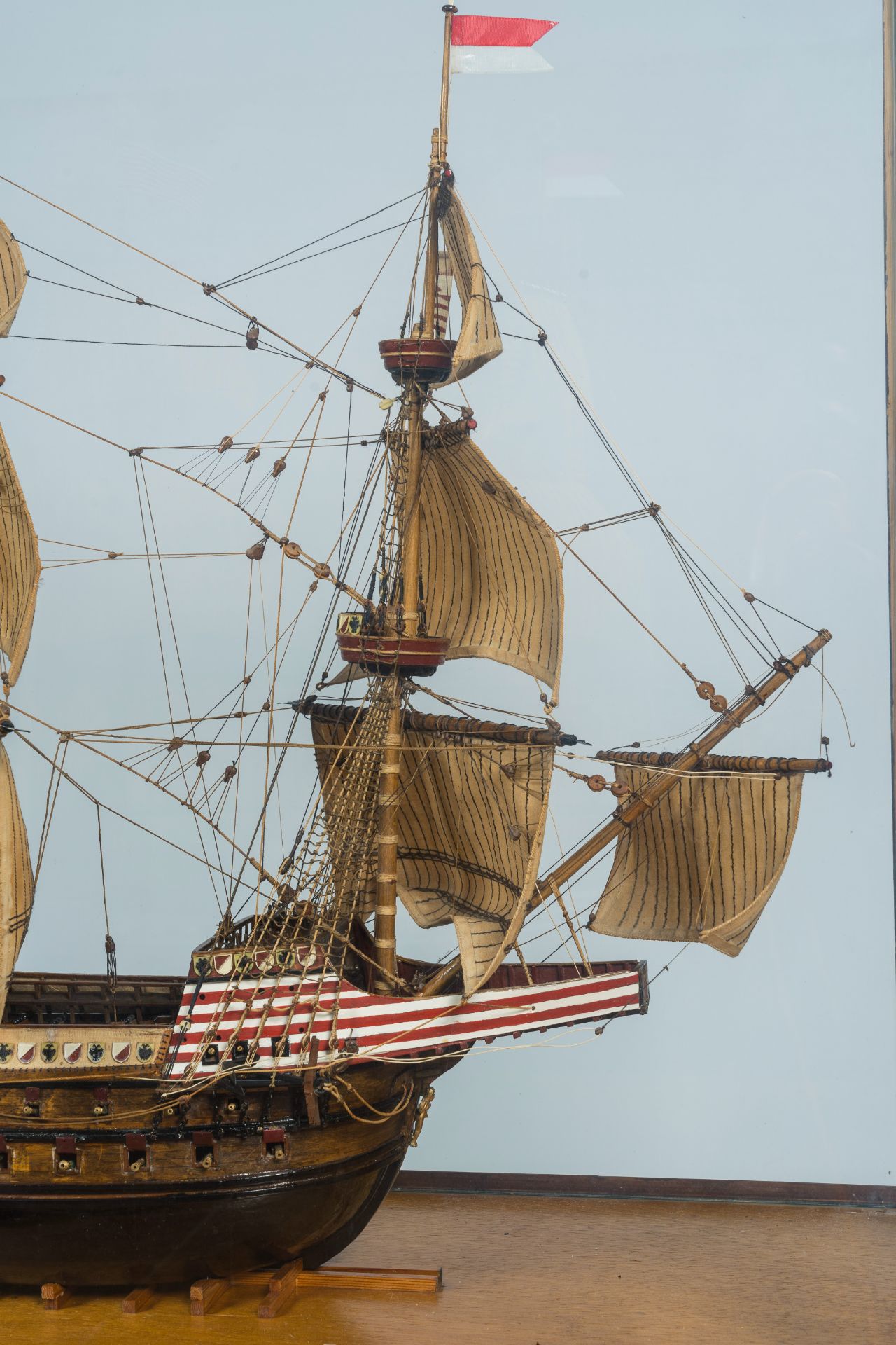 A painted wood model of a 16th-C. German galleon with glass display case, 20th C. - Image 4 of 6