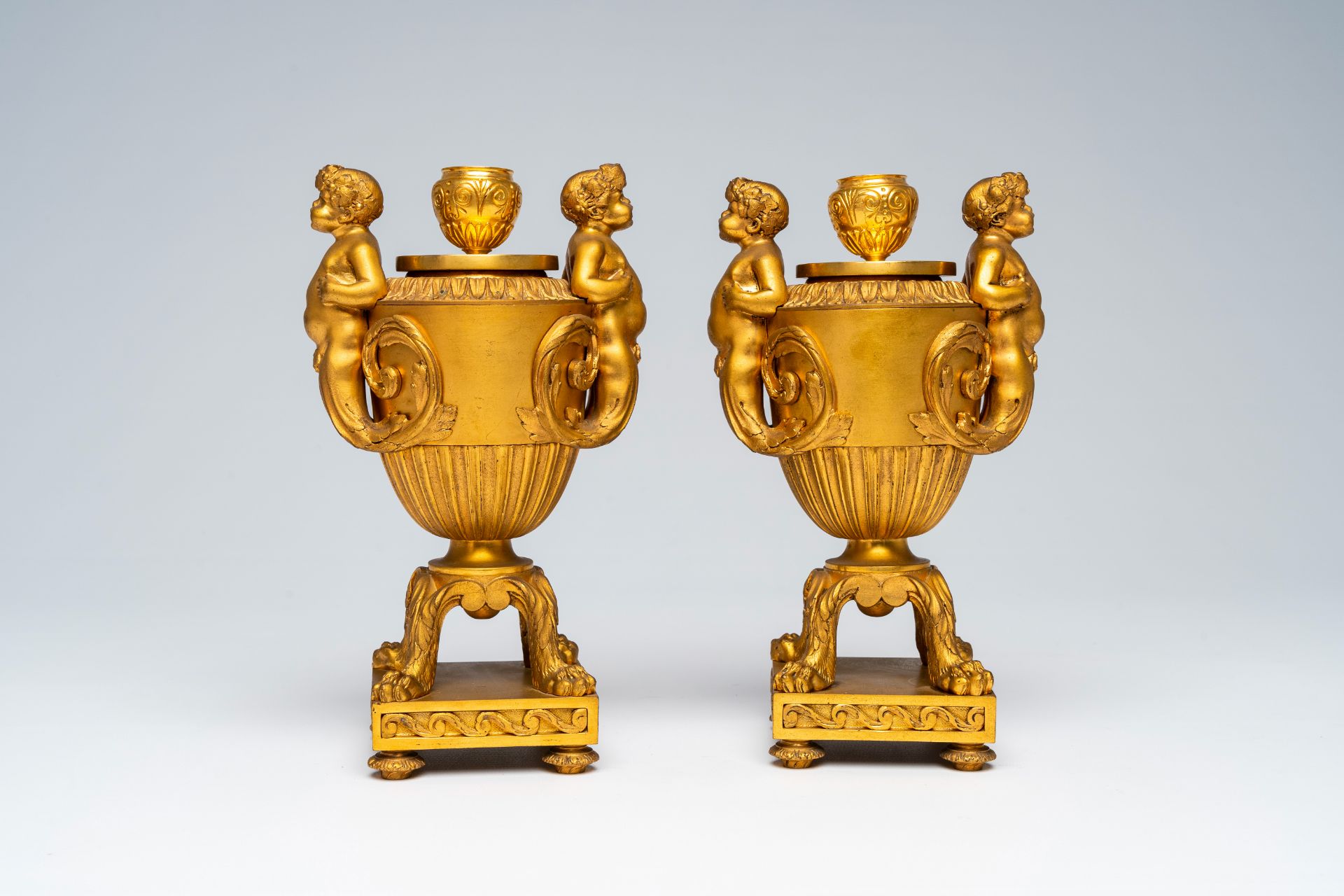 A pair of French gilt bronze vases and covers with bacchantes and lion's feet convertible into candl - Image 3 of 8