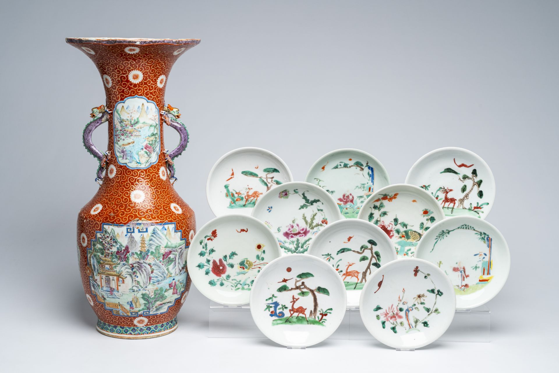 A Chinese famille rose vase after a Japanese example and ten famille rose dishes with animated scene