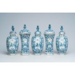 A Dutch Delft blue and white five-piece vase garniture with animals in a landscape, 18th C.