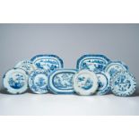 Seven Chinese blue and white plates and three chargers with an animated river landscape, Qianlong/Ji