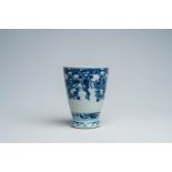 A Chinese blue and white cup after a European model with floral design, Kangxi