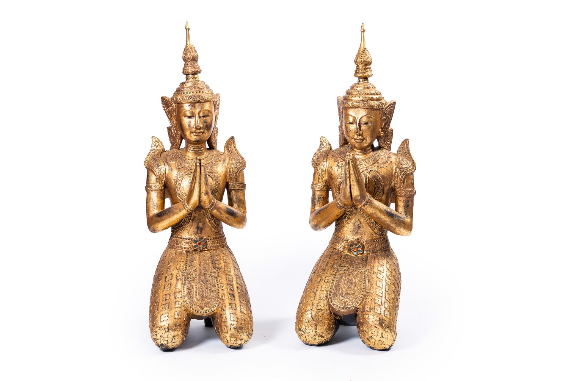 A pair of tall inlaid gilt wood figures of a kneeling Buddha, Thailand, 20th C. - Image 2 of 15