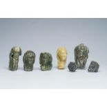 A varied collection of carved stone fragments in Roman style