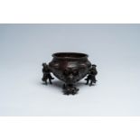 A Chinese lacquered bronze 'foreigners' censer, Ming