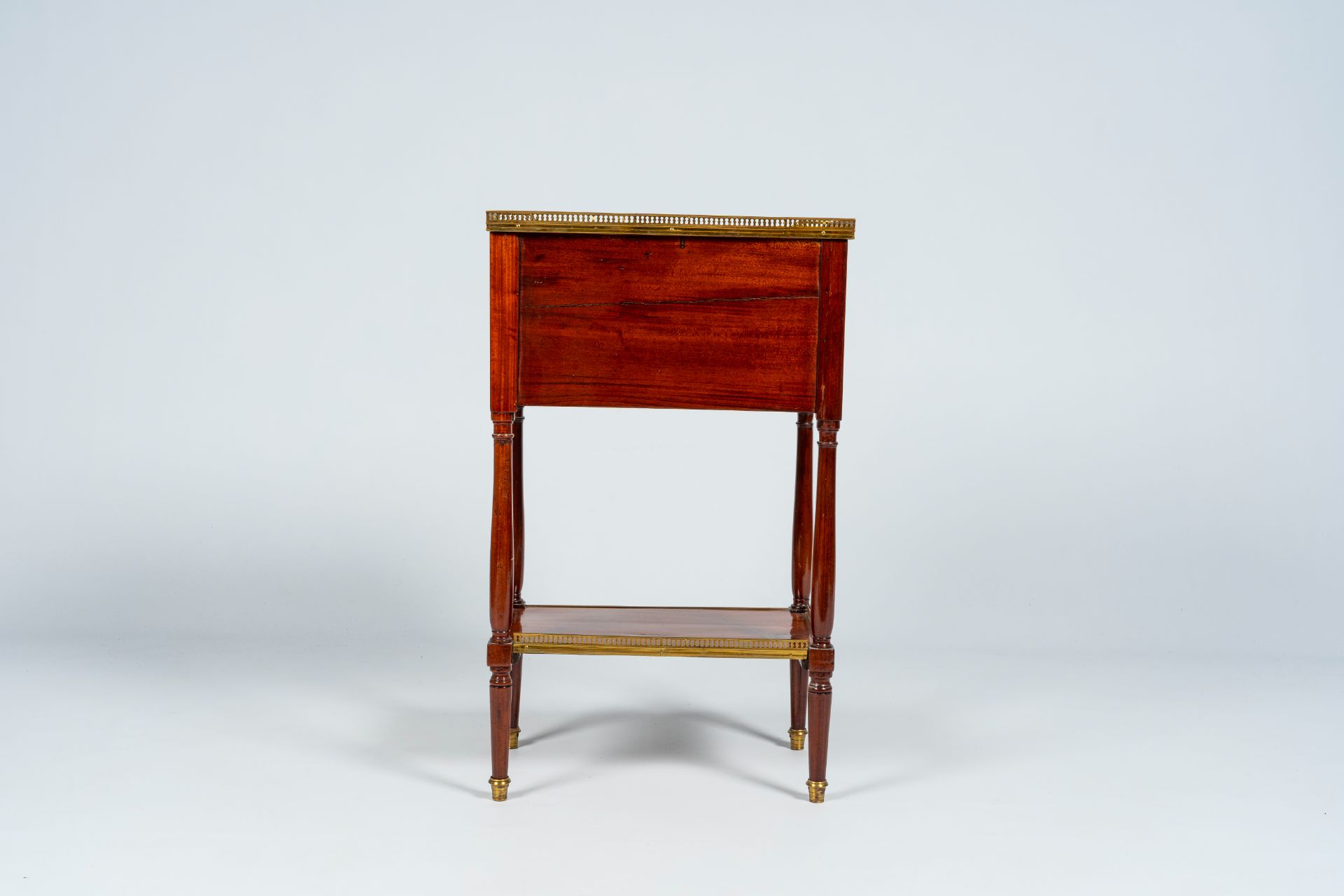 A French mahogany gilt brass mounted side table with three drawers, late 19th C. - Image 5 of 8