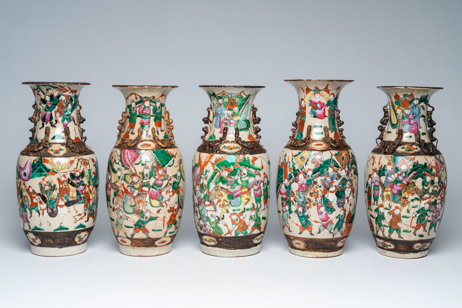 Five Chinese Nanking crackle glazed famille rose 'warrior' vases, 19th/20th C. - Image 3 of 5