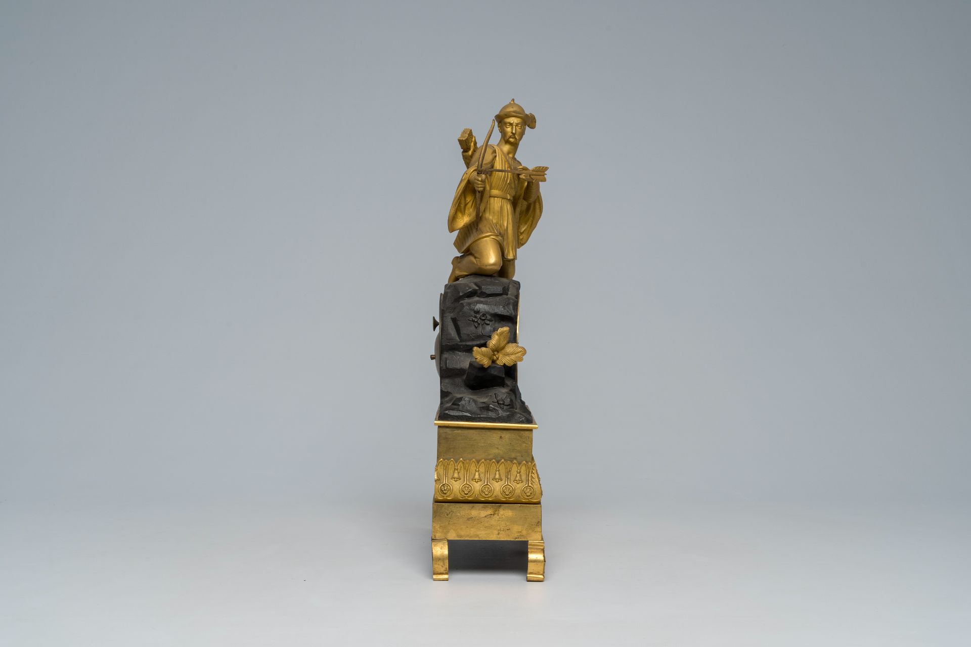 A French gilt and patinated bronze mantel clock topped with a Moorish archer, 19th C. - Image 4 of 9