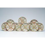 Eleven Chinese Canton famille rose plates with palace scenes and floral design, 19th C.