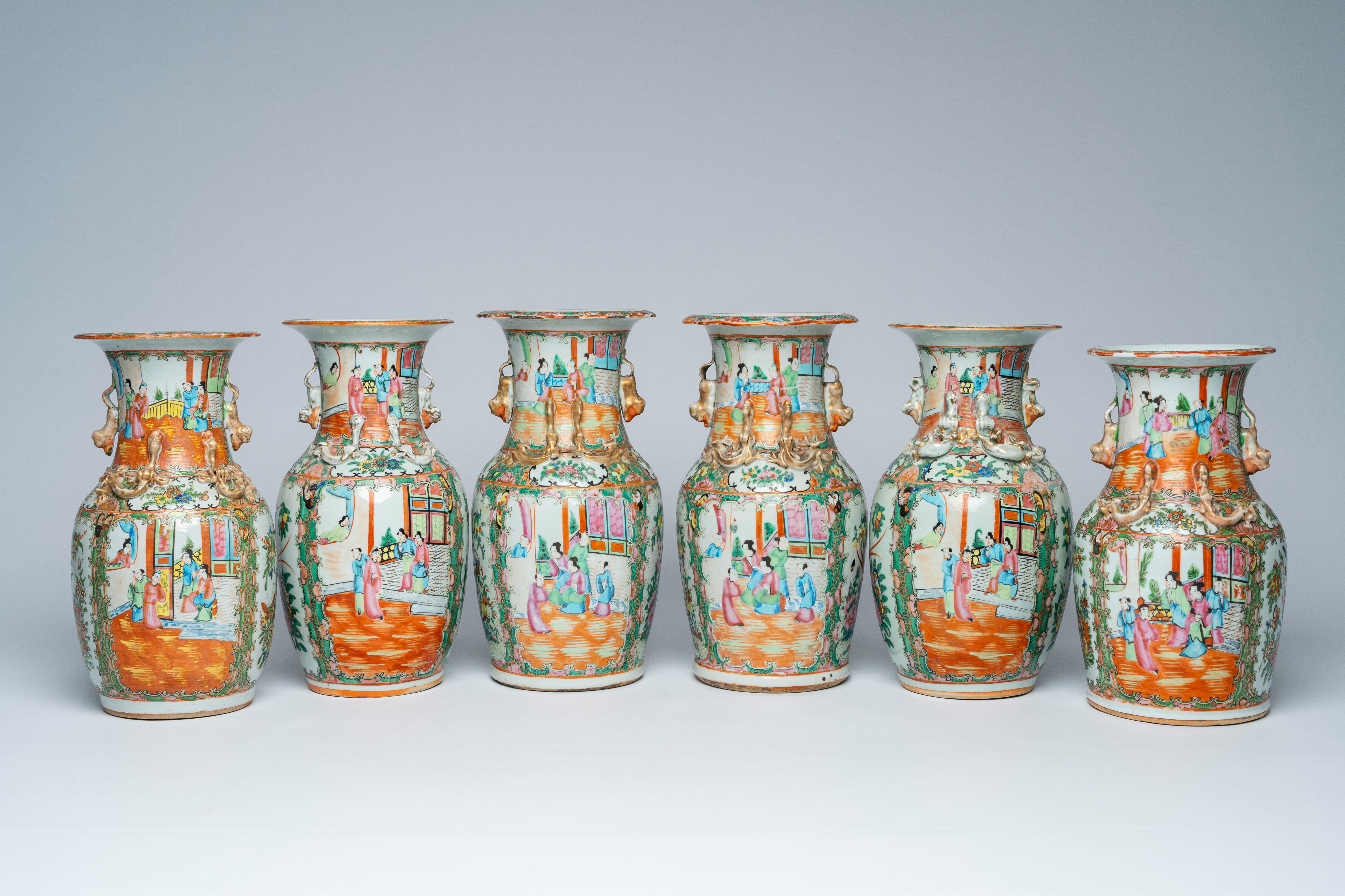Six various Chinese Canton famille rose vases with palace scenes and birds among blossoming branches