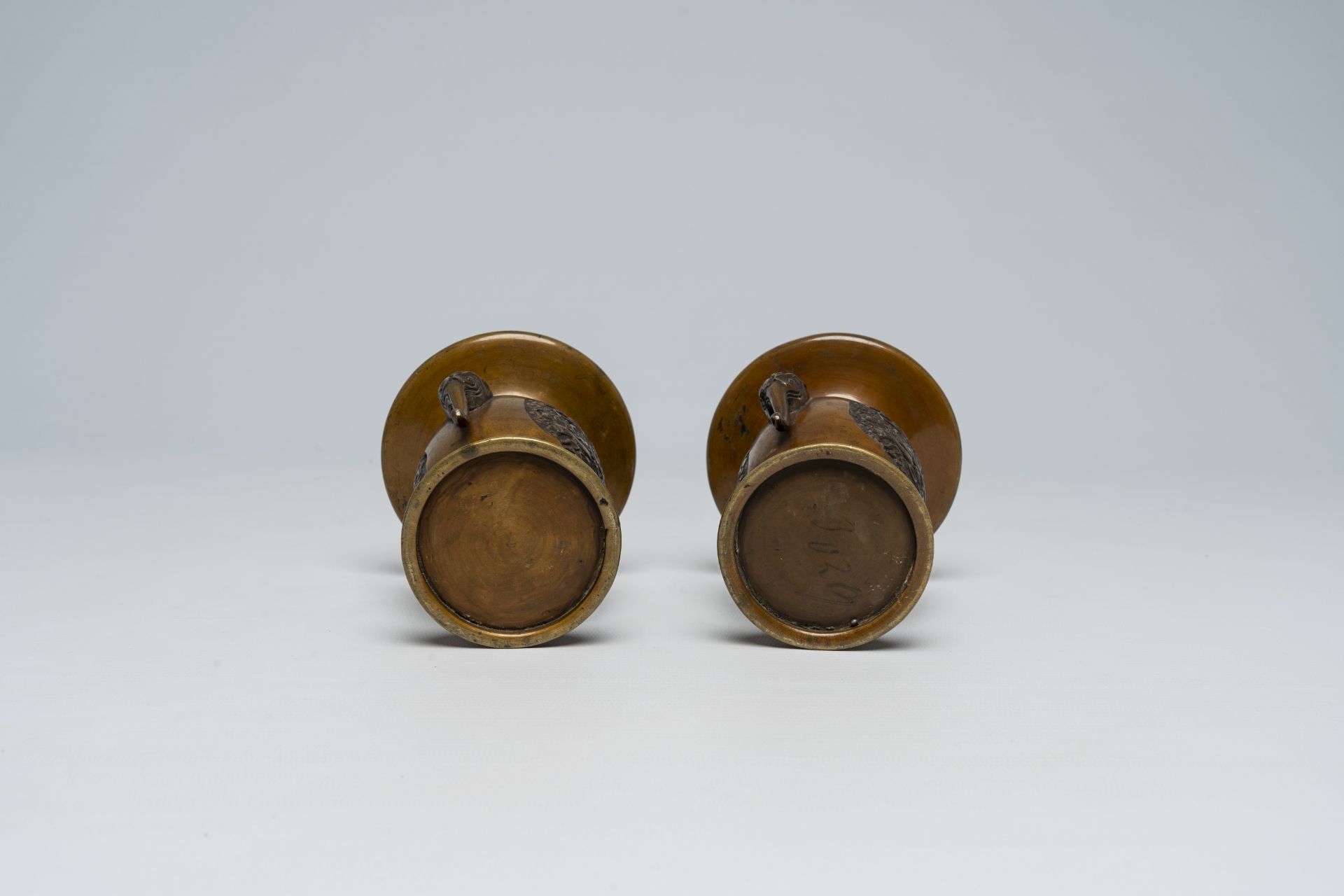 A pair of Japanese bronze vases, two mixed metal chargers with relief design, a blue and white dish - Image 10 of 21