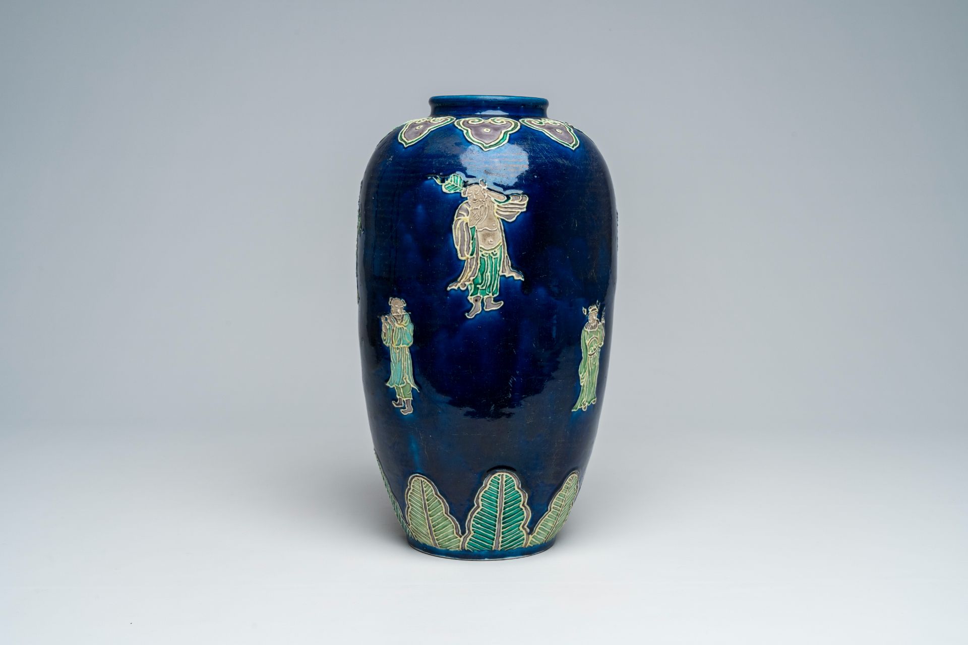 A Chinese fahua 'Eight Immortals' vase, 19th C.