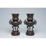 A pair of Japanese bronze vases with Tokugawa medallions in relief, Meiji, 19th C.