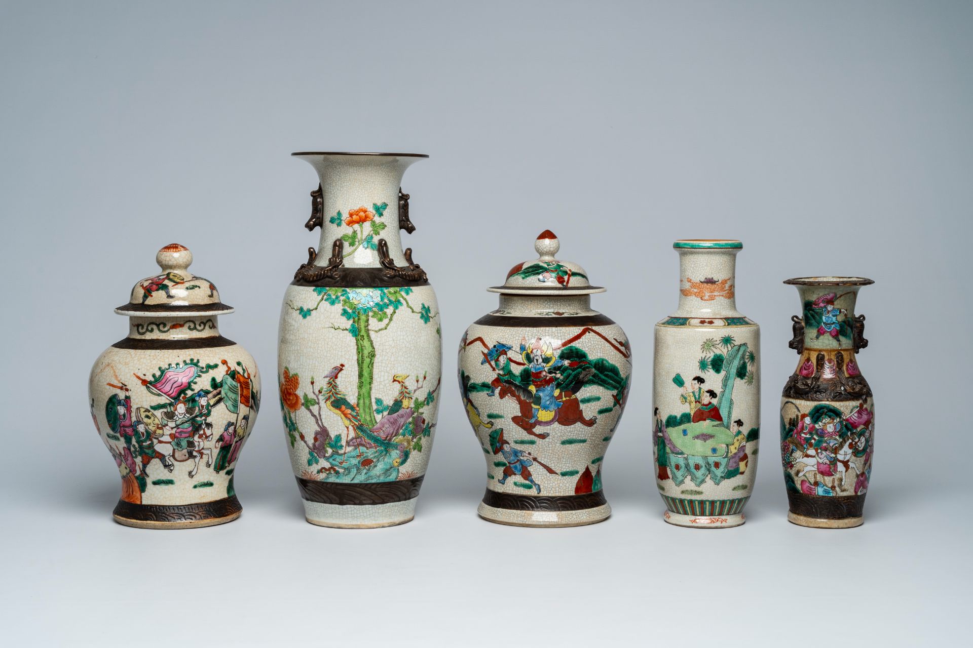 A varied collection of Chinese Nanking crackle glazed famille rose and verte vases and jars with war - Image 2 of 13