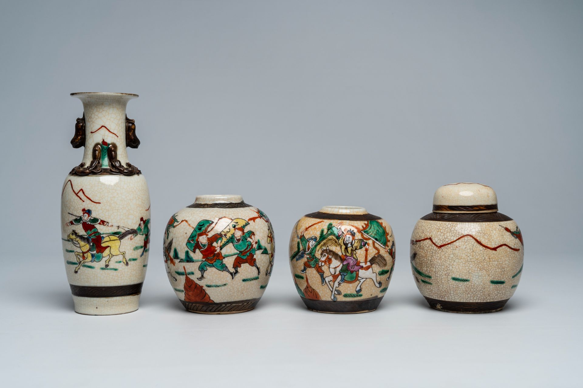 A varied collection of Chinese Nanking crackle glazed famille rose and verte vases and jars with war - Image 10 of 13