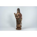 A large Chinese carved and polychrome painted wood figure of Guanyin, Qing/Republic