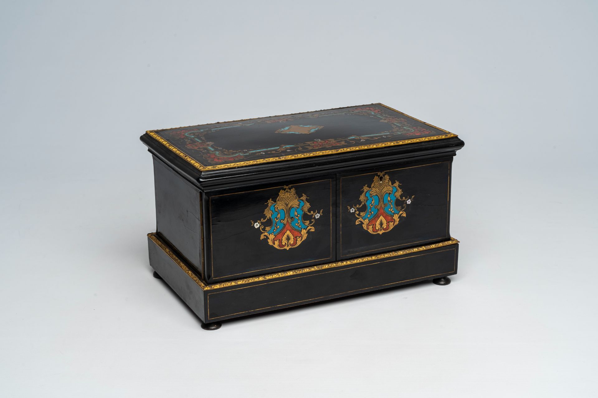 A French Historicism bronze mounted ebonised wooden tortoiseshell, mother-of pearl and brass marquet