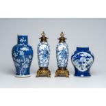 A pair of Chinese blue and white bronze mounted vases and two blue and white vases with floral desig