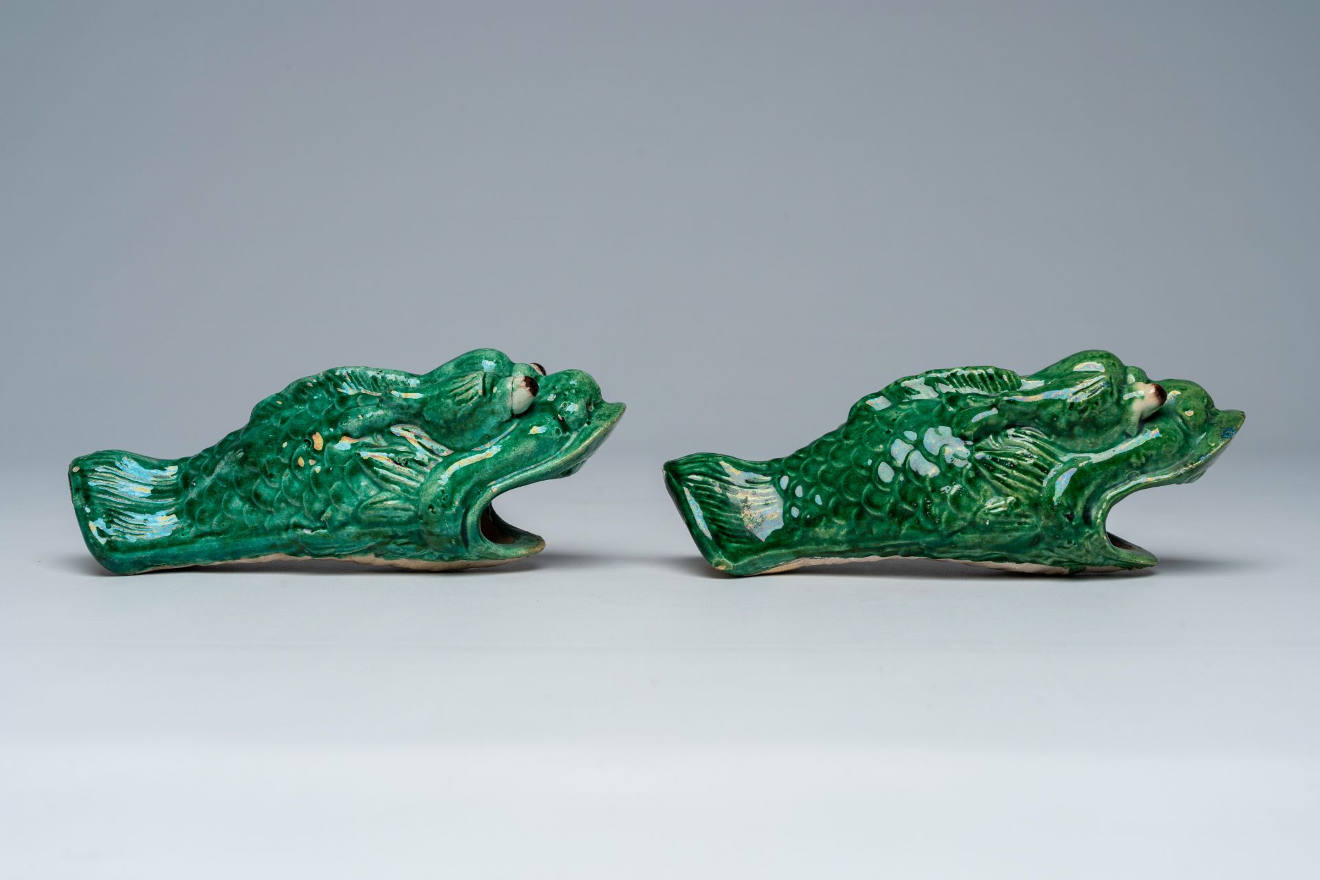 A pair of Chinese green glazed earthenware 'carp' wall vases, ca. 1900 - Image 2 of 7