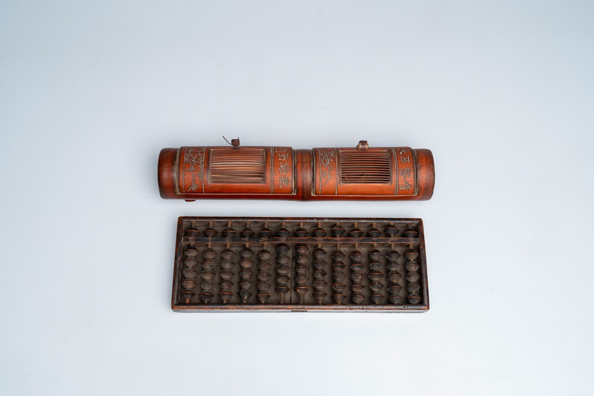 Six various Chinese Feng Shui compasses, a bamboo cricket box and an abacus, 19th/20th C. - Image 4 of 5