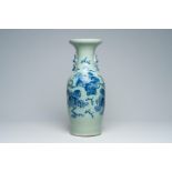 A Chinese blue and white 'Buddhist lions' celadon ground vase, 19th C.