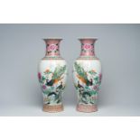 A pair of Chinese famille rose baluster vases with peacocks among blossoming branches, Jingdezhen ma