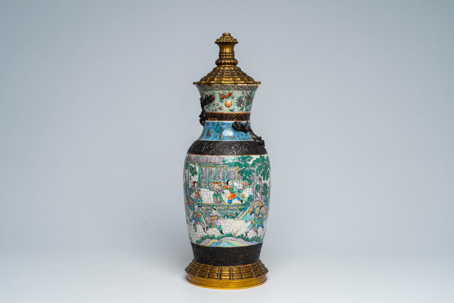 A Chinese Nanking crackle glazed bronze mounted famille rose 'warrior' vase, 19th C.