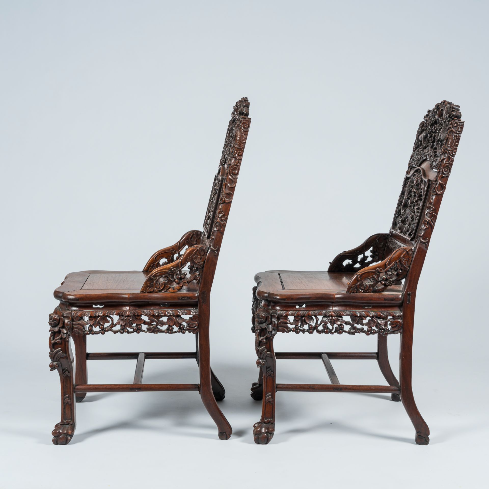 A pair of Chinese carved hardwood 'dragon' chairs, 19th C. - Image 3 of 10