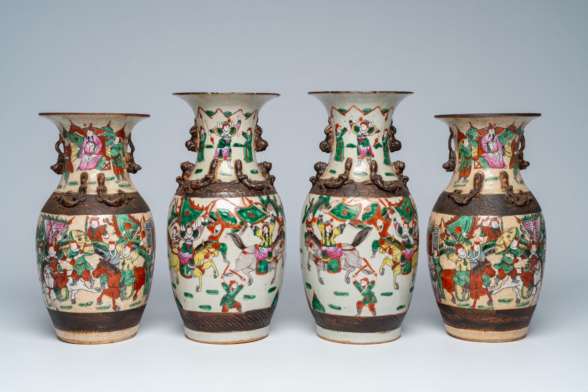 Two pairs of Chinese Nanking crackle glazed famille rose 'warrior' vases, 19th C. - Image 4 of 7