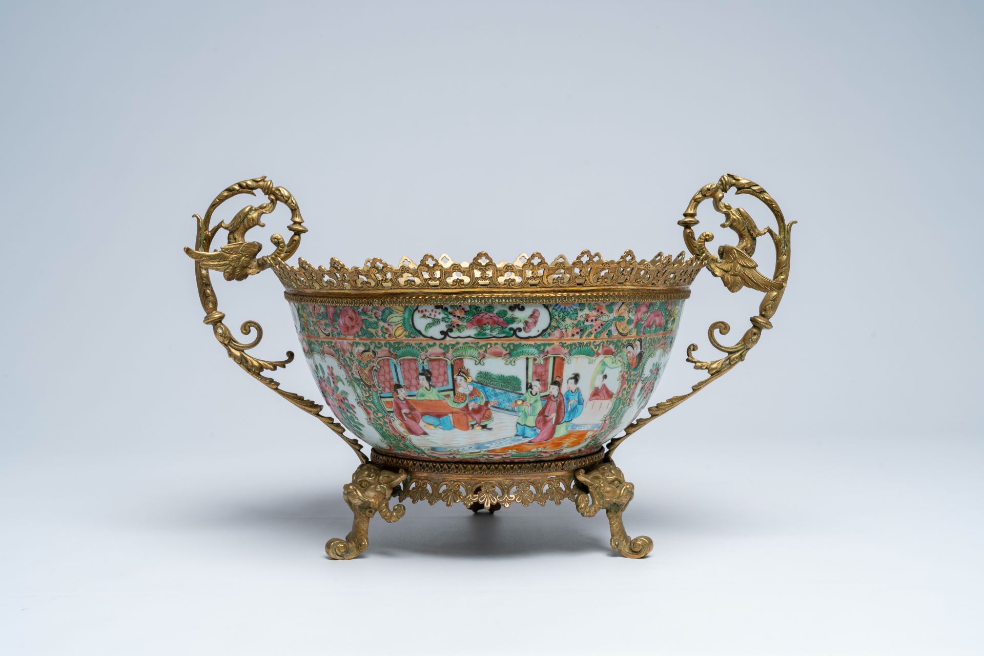 A Chinese Canton famille rose brass mounted bowl with palace scenes and floral design, 19th C. - Image 2 of 7